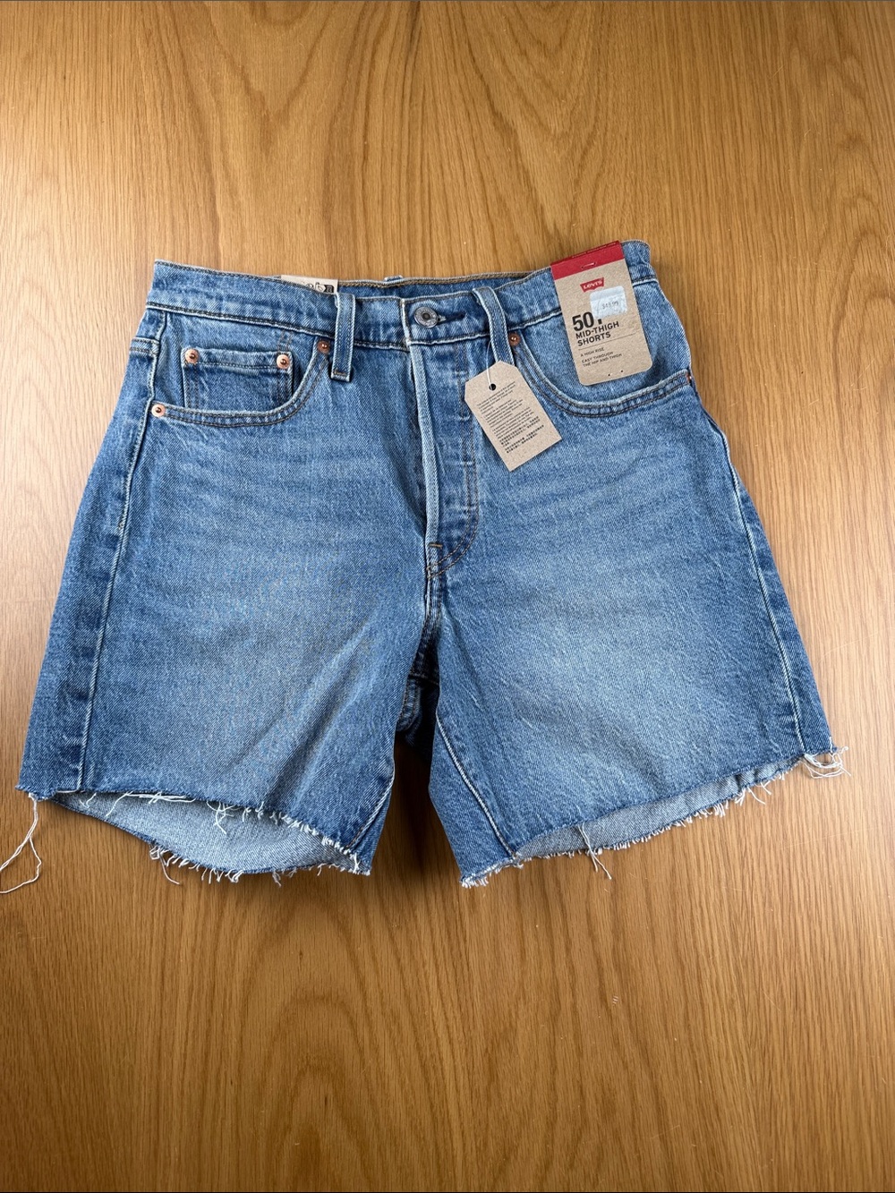 Levi's women’s High-Rise Cutoff Denim Mid-Thigh Shorts 858330074 size 27